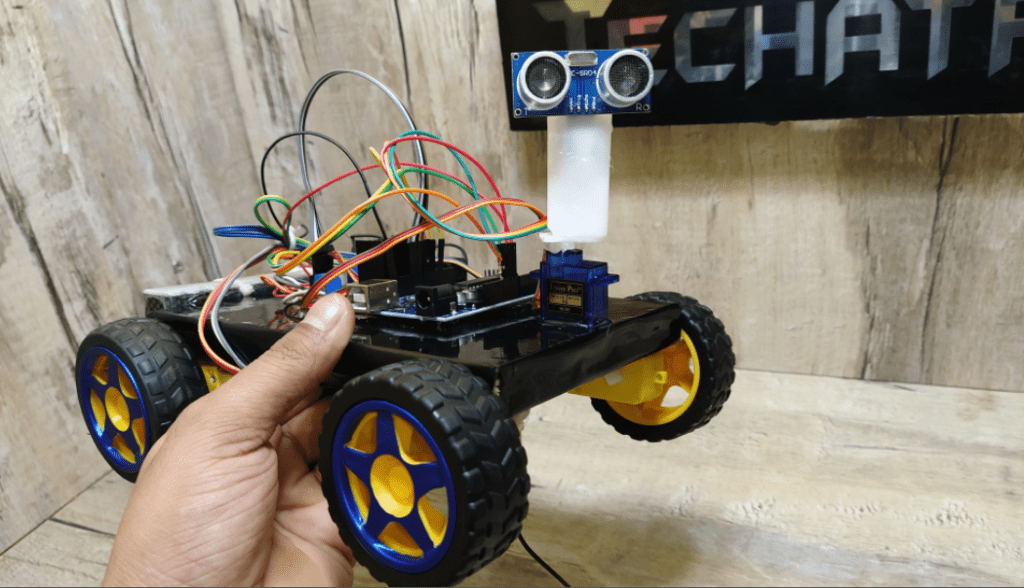 Obstacle avoiding store robot with servo