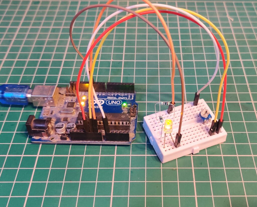 connect a potentiometer to the Arduino
